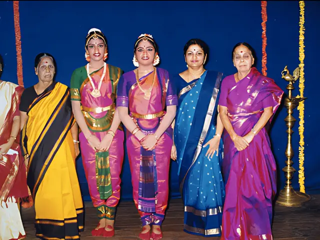 Mathura, Lalitha, and Amritha, with their dance teacher Ms. Kausalya (R) and vocalist Ms. Kamala (L)